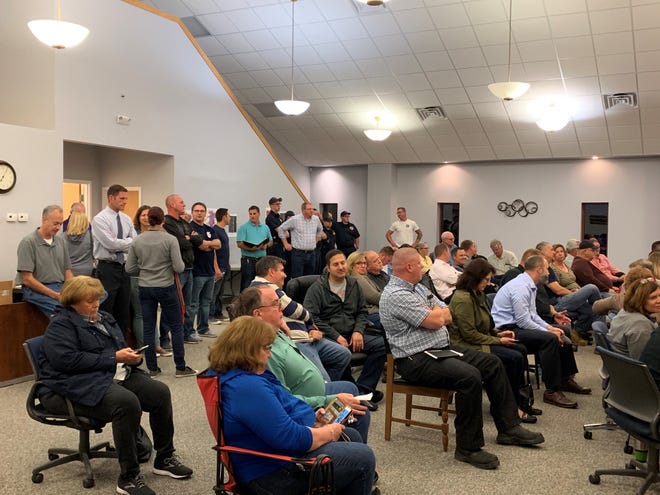 About 75 people gathered for a Union Township trustees meeting on Oct. 21, 2019 to discuss the possible formation of a fire district between Union Township and Hebron.