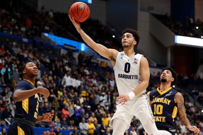 Mar 21, 2019; Hartford, CT, USA; Marquette Golden Eagles guard Markus Howard (0) attempts a layup against the Murray State Racers during the second half off a game in the first round of the 2019 NCAA Tournament at XL Center. Mandatory Credit: David Butler II-USA TODAY Sports