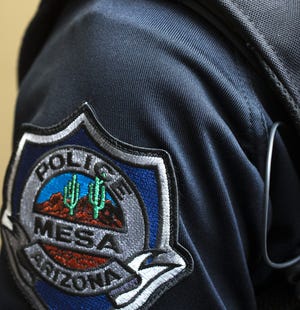 A Mesa Police Department badge is seen here.