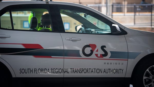  A G4S guard sits in his company car outside a Tri