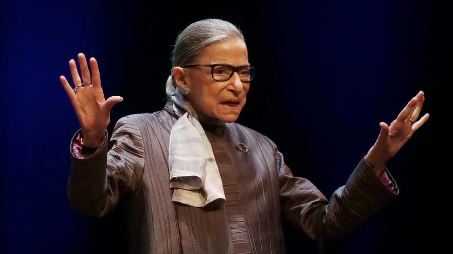Supreme Court Justice Ruth Bader Ginsburg gestures while introduced during the inaugural Herma Hill Kay Memorial Lecture at the University of California at Berkeley, Oct. 21, 2019, in Berkeley, Calif.