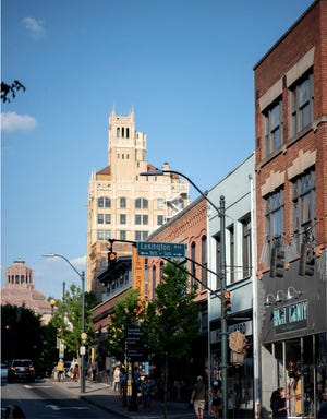 Downtown Asheville's Jackson Building and City Hall are showcased in a new report by PGAV and commissioned by the Buncombe County Tourism Development Authority. The report lays out several actions to improve upon local tourism culture, including protecting the area's authenticity and better managing its growth.