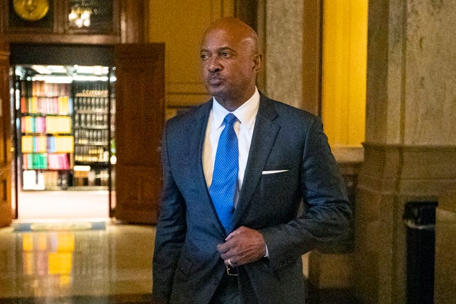 Indiana Attorney General Curtis Hill arrives for a hearing at the state Supreme Court in the Statehouse, Wednesday, Oct. 23, 2019, in Indianapolis. Hill faces a hearing over whether allegations that he drunkenly groped four women at a bar amounted to professional misconduct.  (AP Photo/Michael Conroy)