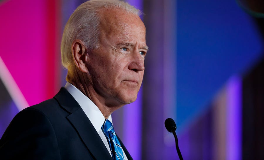 Democratic presidential candidate former Vice President Joe Biden promises a female running mate.