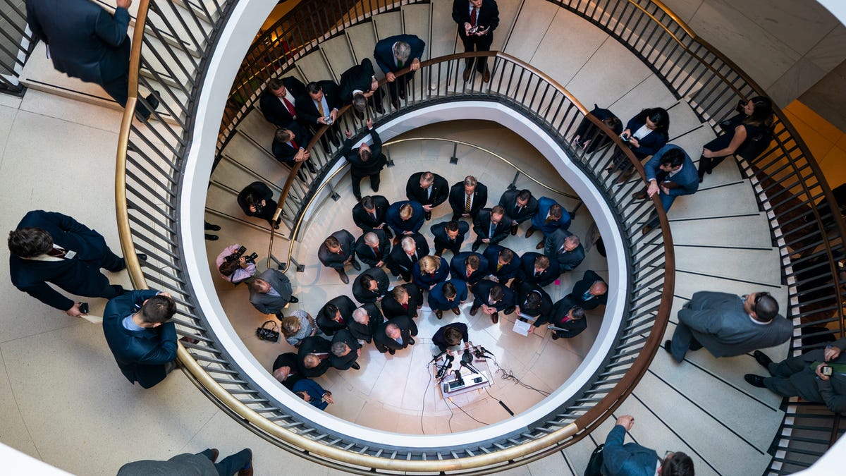 More than two dozen Republican lawmakers speak to the media before gathering outside the room used by the House of Representatives' impeachment inquiry into President Trump in the US Capitol in Washington, DC on October 23, 2019.
