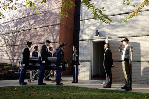 Pallbearers pause before entering the Murphy Fine Arts Center at Morgan State University ahead of a public viewing for U.S. Rep. Elijah Cummings, Oct. 23, 2019, in Baltimore.