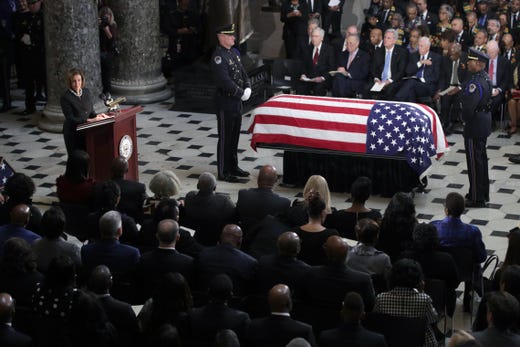 Speaker of the House Rep. Nancy Pelosi (D-CA) gives remarks next to the flag-draped casket of of late Rep. Elijah Cummings D-Md as the late congressman lies in state during a memorial service at the Statuary Hall of the U.S. Capitol Oct. 24, 2019 in Washington.&nbsp;