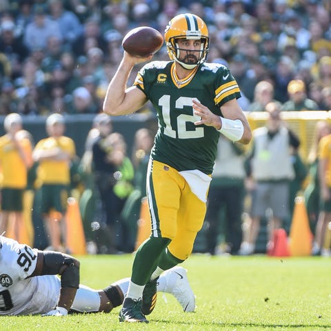 Green Bay Packers quarterback Aaron Rodgers (12) t