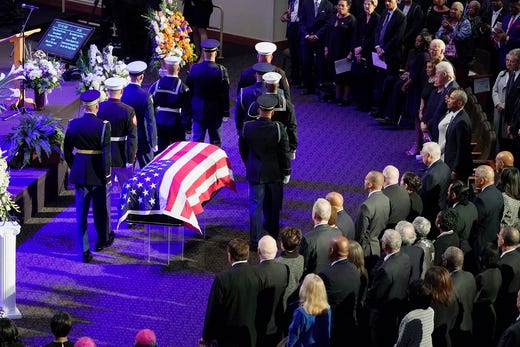 The flag-draped casket of late Rep. Elijah Cummings is seen at the start of funeral services for Cummings at the New Psalmist Baptist Church Oct. 25, 2019 in Baltimore. Cummings died last week of complications from longstanding health problems at the age of 68. 