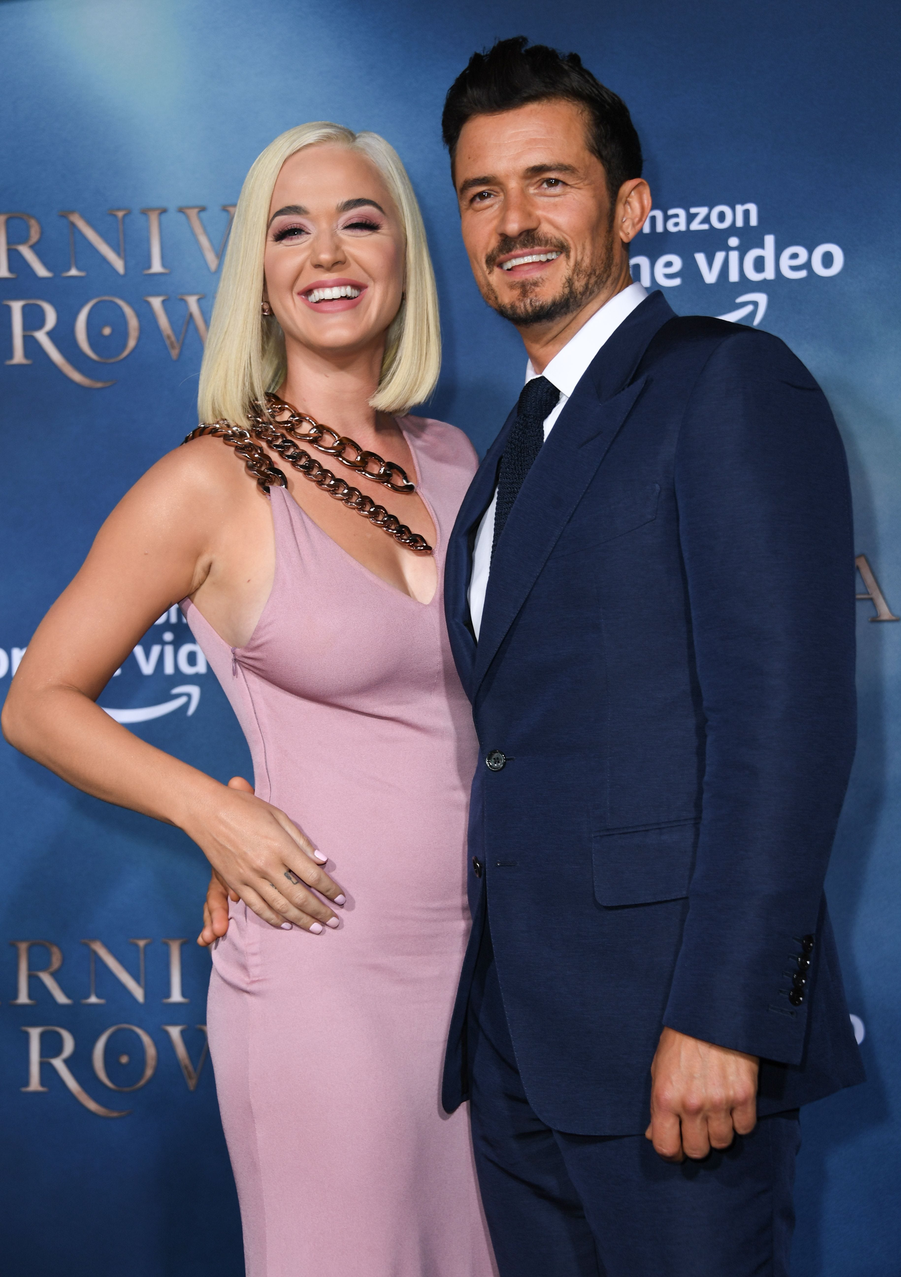 British actor Orlando Bloom and US singer/songwriter Katy Perry arrive for the Los Angeles premiere of Amazon Original Series "Carnival Row" at the TCL Chinese theatre on August 21, 2019 in Hollywood. (Photo by VALERIE MACON / AFP)VALERIE MACON/AFP/Getty Images ORG XMIT: "Carnival ORIG FILE ID: AFP_1JO4L0