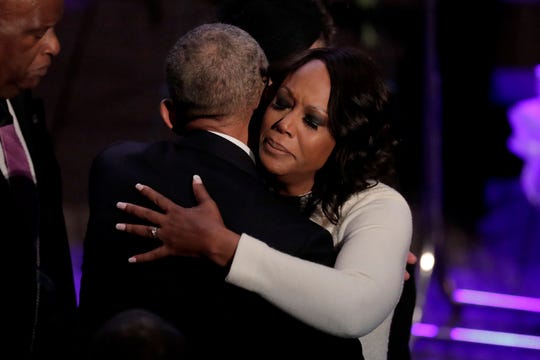 Maya Rockeymoore Cummings, right, is greeted by former President Barack Obama during funeral services for her husband, the late Rep. Elijah Cummings,  on Friday, Oct. 25, 2019, in Baltimore. The Maryland congressman and civil rights champion died Thursday, Oct. 17, at age 68 of complications from long-standing health issues.