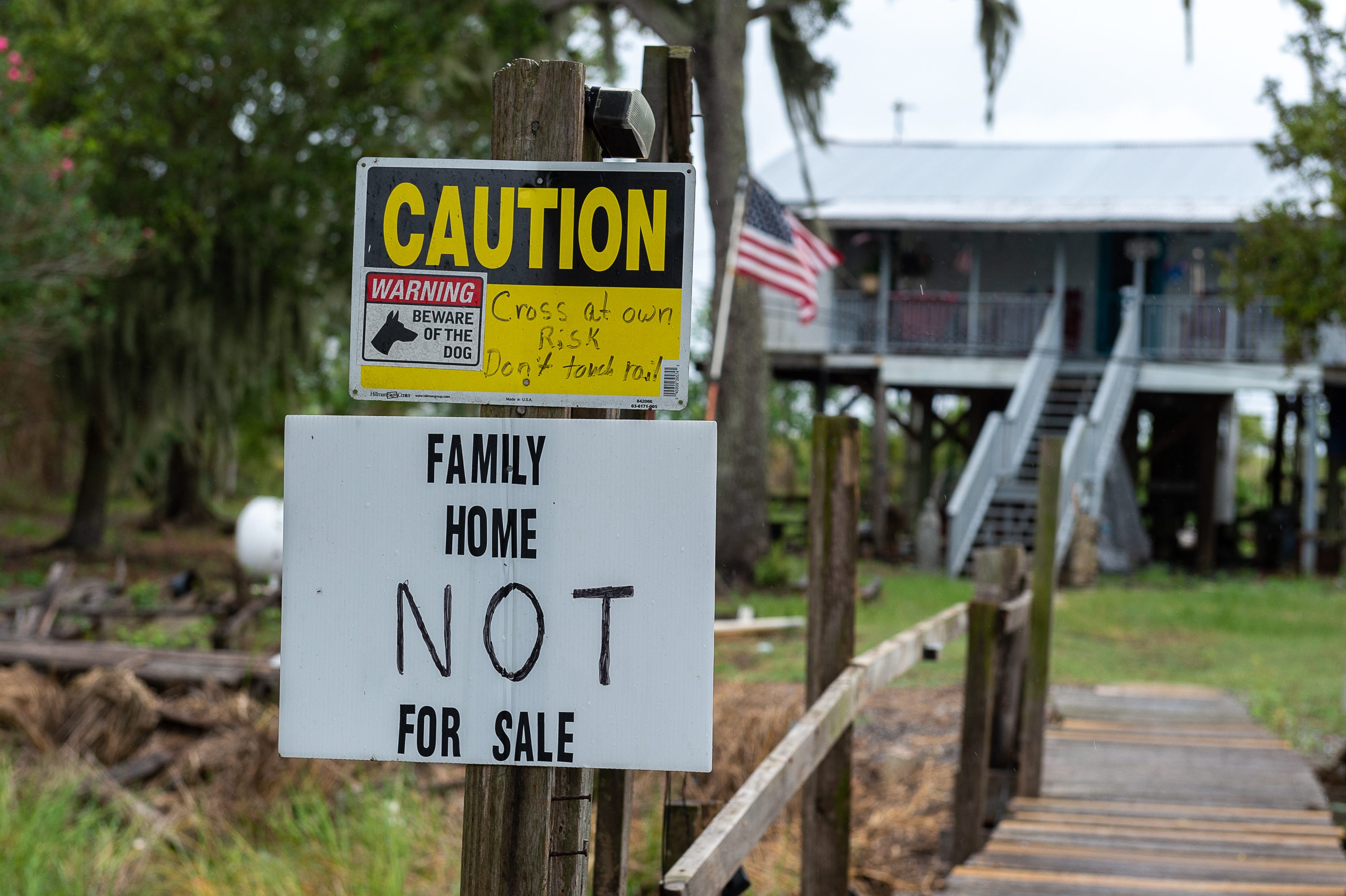 Rumors of outsiders offering to buy Isle De Jean Charles camps has prompted some to put up signs such as this.