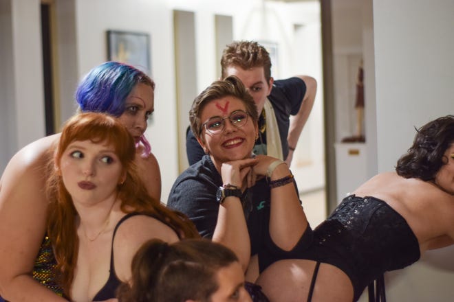 An FSU student shows off their bright red "V" for virgin before the screening of "Rocky Horror Picture Show" that took place at the Student Life Cinema on Saturday, Oct. 19, 2019.