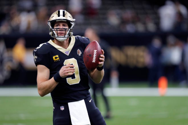 New Orleans Saints quarterback Drew Brees (9) warms up before an NFL football game against the Arizona Cardinals in New Orleans, Sunday, Oct. 27, 2019. (AP Photo/Bill Feig)