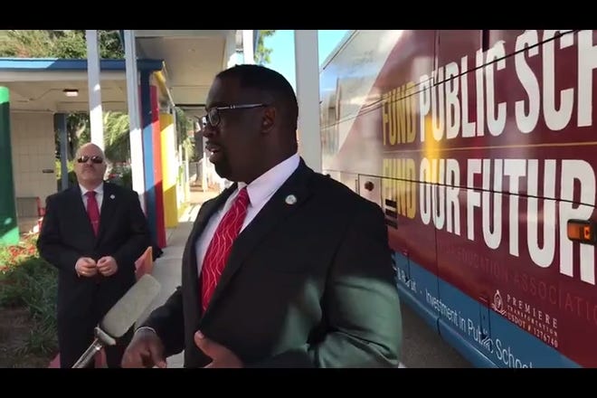 FEA President Fedrick Ingram explains Fund our Future bus tour. It seeks $20 billions for schools