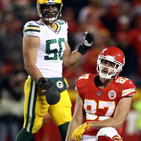 Chiefs tight end Travis Kelce reacts after missing