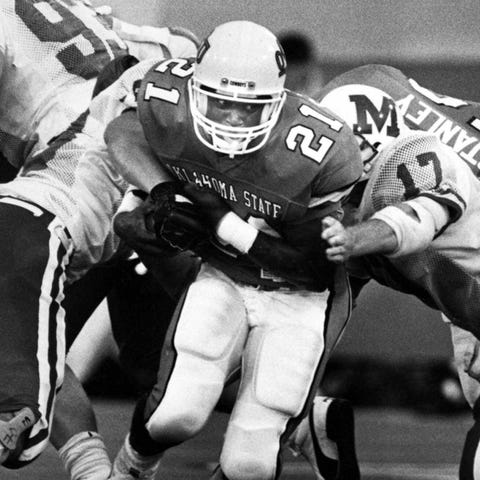 Barry Sanders shown playing for Oklahoma State.