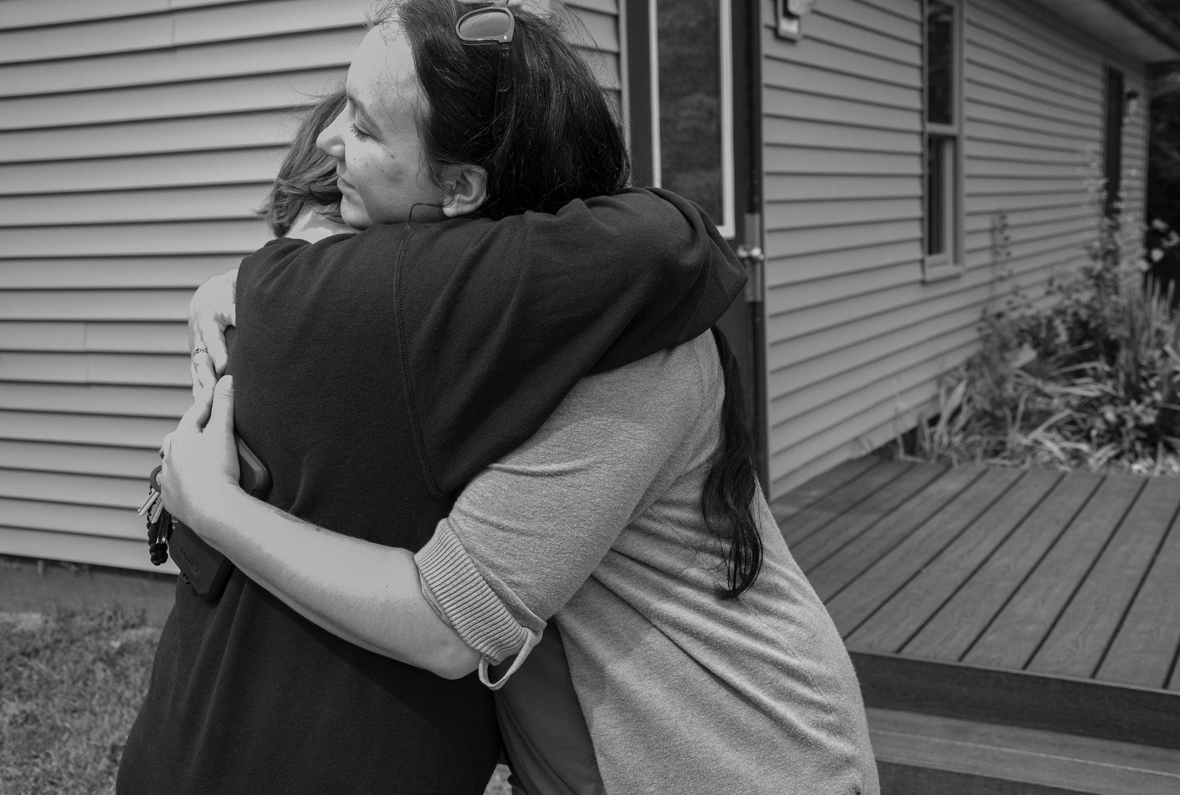 The girl from Taylor, left, hugs her therapist Rebecca Lutz at Wolverine Growth and Recovery Center in Vassar Monday, Aug. 26, 2019. The girl was court ordered to this facility which is part juvenile detention center and part residential drug rehabilitation.