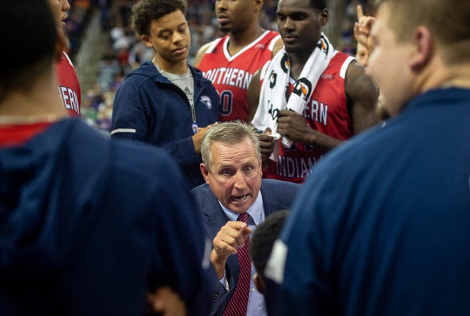 USI coach Rodney Watson talks to his team during a timeout at the USI-UE exhibition game at the Ford Center in Evansville, Monday, Oct. 28, 2019. Watson became USI's all-time winningest coach with his 232nd victory on Monday against Kentucky Wesleyan.