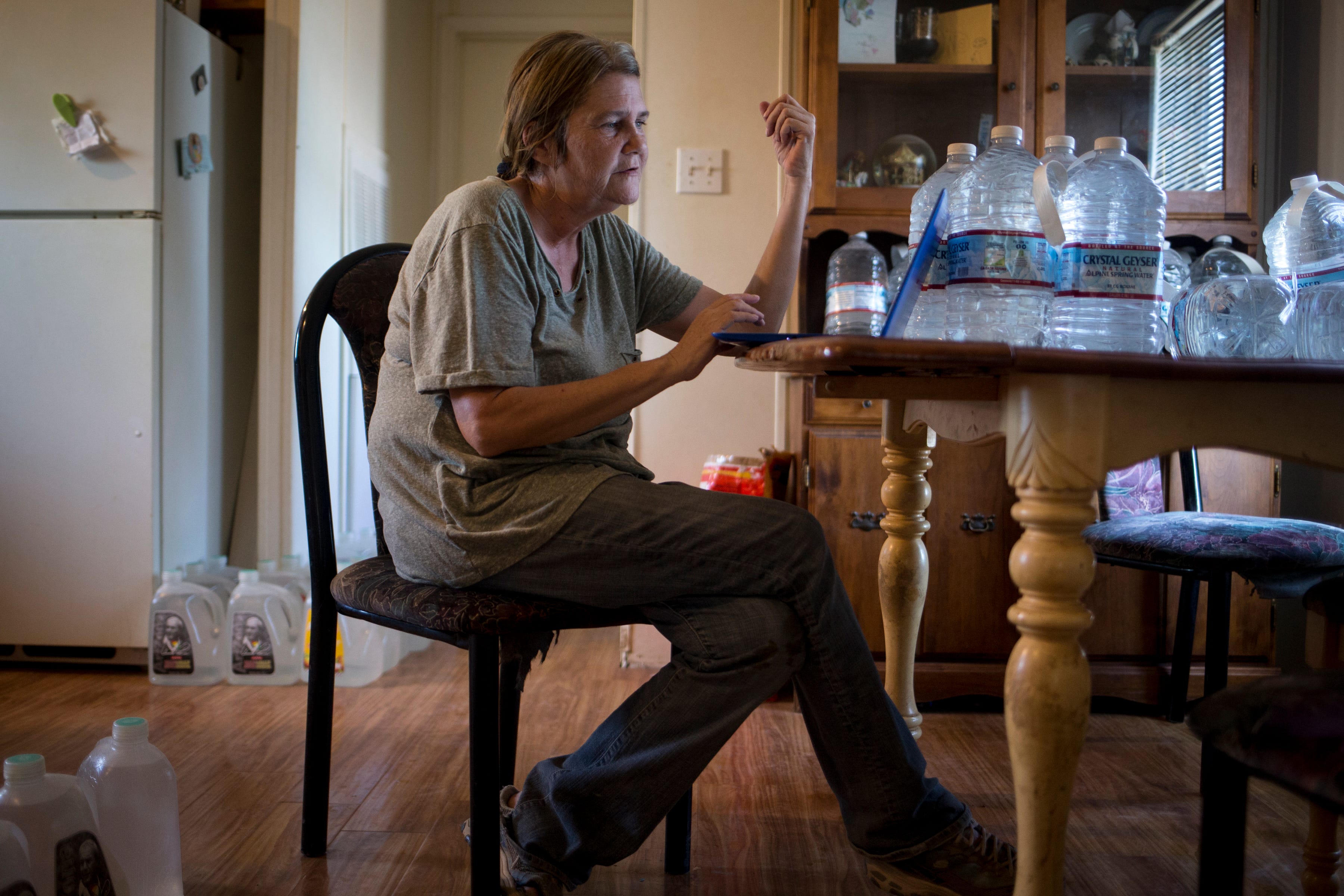 Nancy Blevins works on her computer, August 28, 2019, Vicksburg, Arizona.