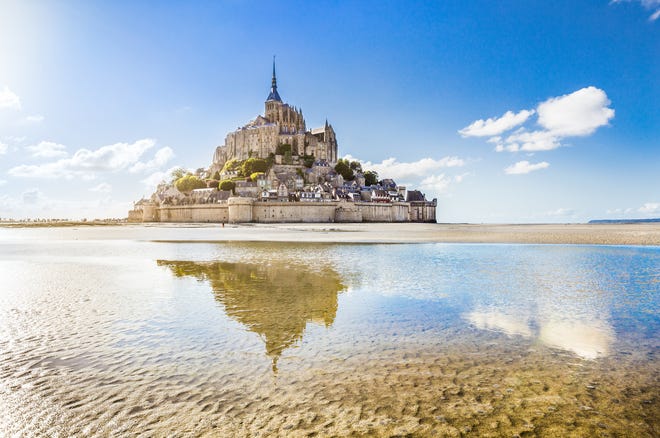 Benedictine monks took up residence at Mont-St.-Michel in 966 A.D., a century before William the Conqueror invaded England. The dramatically pointed island is topped by the Mont-Saint-Michel Abbey,
