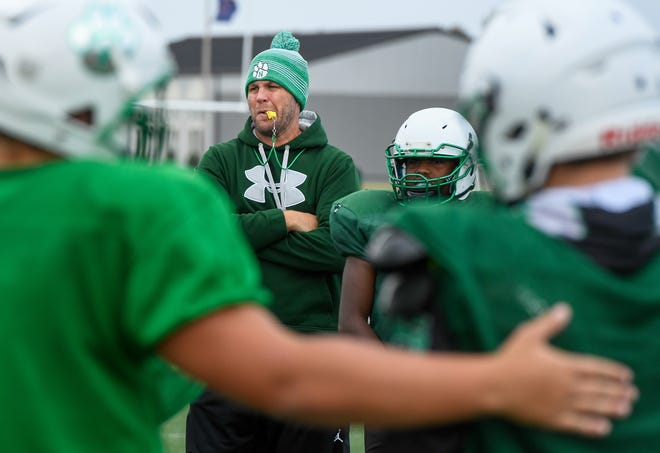North High football coach Joey Paridaen watches over practice Thursday afternoon at Bundrant Stadium, October 24, 2019.