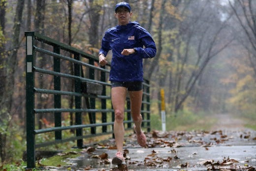 Roberta Groner is shown during a training run on a wet Columbia Trail, in Long Valley. Groner, who was the first American to finish at the World Championship marathon in Doha, Qatar, on September 27, will be running the New York City Marathon on November 3. Groner is a mother of three as well as a full time nurse, and still manages time to run approximately 100 miles a week during her peak training. Sunday, October 27, 2019