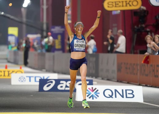 Sep 27, 2019; Doha, Qatar; Roberta Groner (USA) celebrates after placing sixth in the women's marathon at the Corniche during the IAAF World Athletics Championships, Mandatory Credit: Kirby Lee-USA TODAY Sports