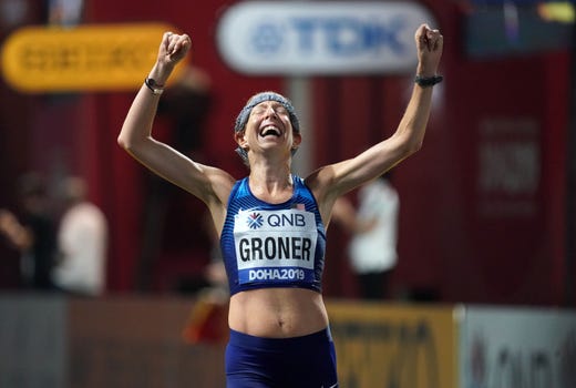 Sep 27, 2019; Doha, Qatar; Roberta Groner (USA) celebrates after placing sixth in the women's marathon in 2:38.44 at the Corniche during the IAAF World Athletics Championships, Mandatory Credit: Kirby Lee-USA TODAY Sports