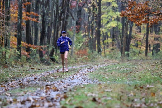 Roberta Groner is shown during a training run on a wet Columbia Trail, in Long Valley. Groner, who was the first American to finish at the World Championship marathon in Doha, Qatar, on September 27, will be running the New York City Marathon on November 3. Groner is a mother of three as well as a full time nurse, and still manages time to run approximately 100 miles a week during her peak training. Sunday, October 27, 2019