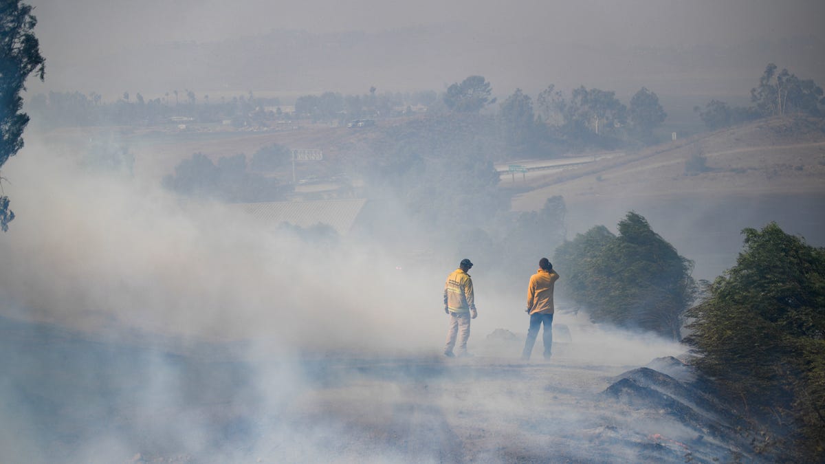 Los Angeles County Firefighters work to contain the Easy Fire inside of Lapeyre Ranch in Moorpark, Calif. on Oct. 30, 2019. 