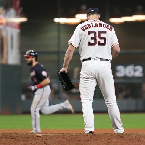 Justin Verlander looks down after a solo home run 