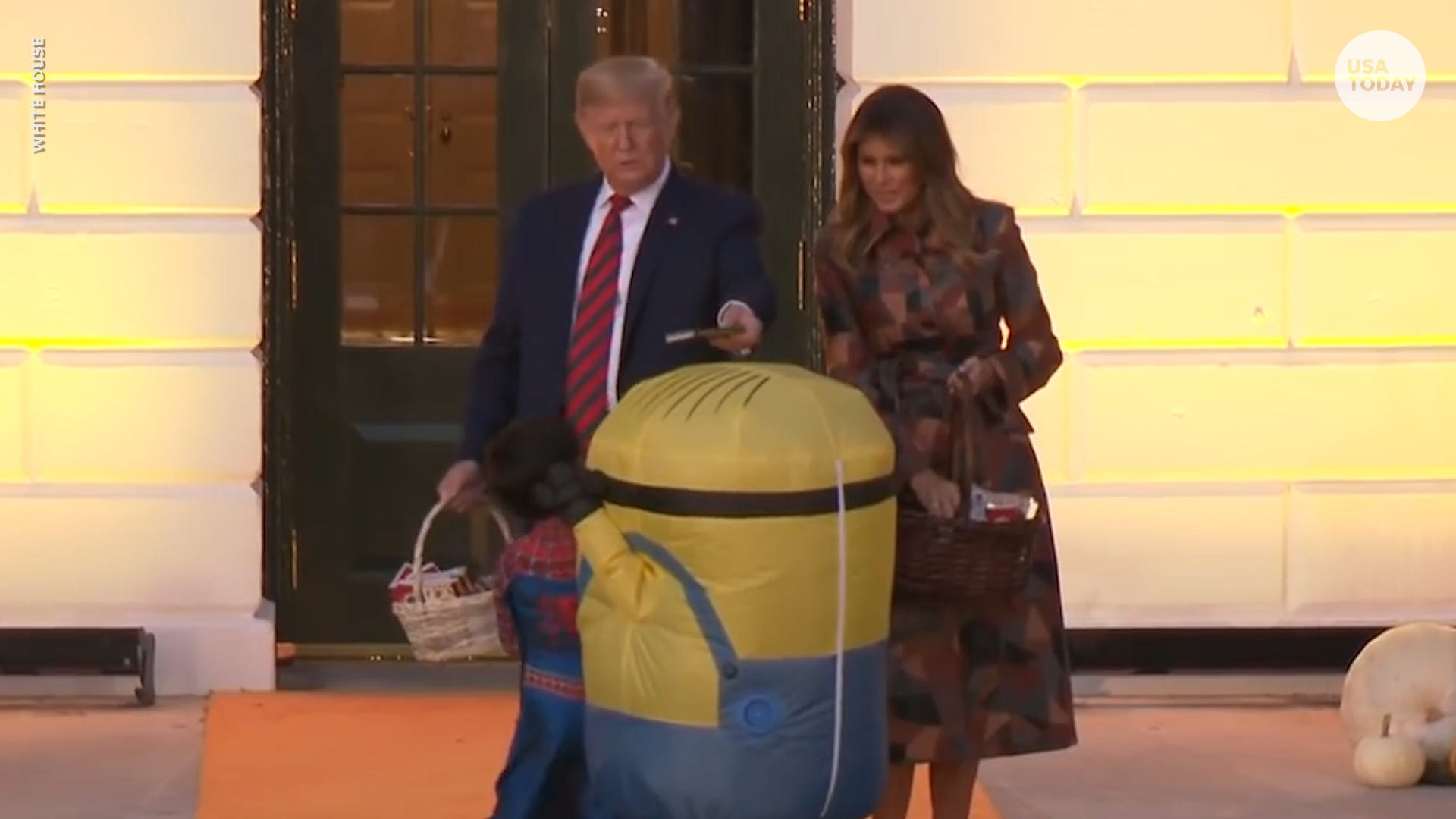 Trump Puts Candy On Child S Minion Halloween Costume At White House