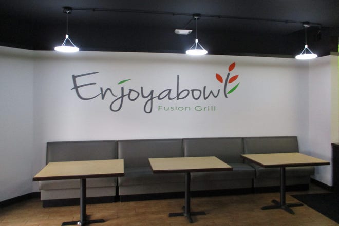 The interior of Enjoyabowl Fusion Grill located at 316 E. Burlington Street in downtown Iowa City.