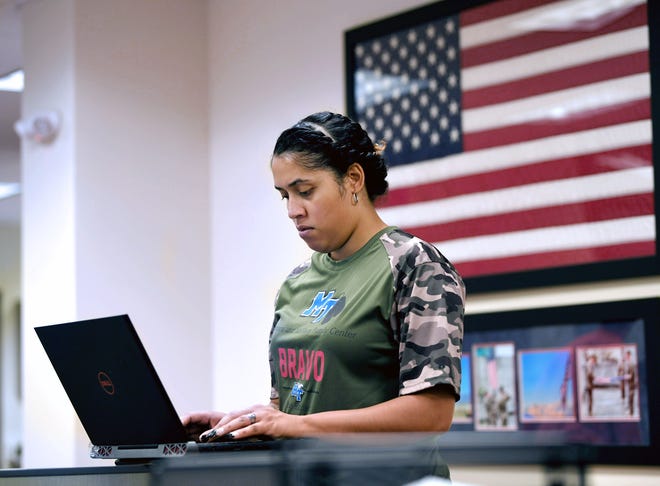 Marine veteran and MTSU student Teresa Carter works on her computer at the Charlie and Hazel Daniels Veterans and Military Family Center at MTSU on Thursday, Oct. 31, 2019.