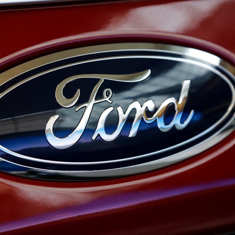 This Feb. 15, 2018, photo shows a Ford logo on a 2