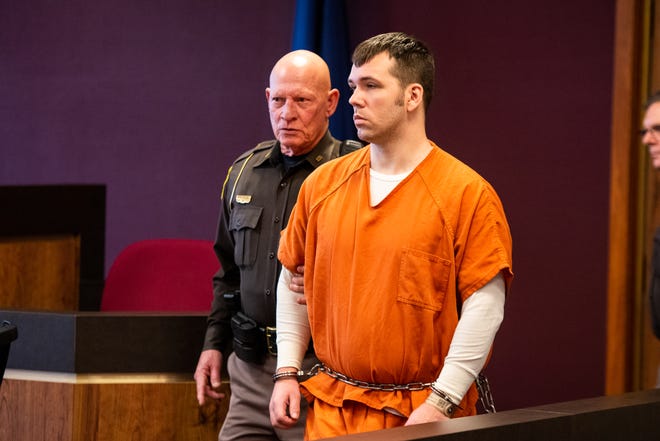 Joshua Bauman enters Judge Daniel Kelly's courtroom for a sentencing hearing in front of visiting Judge William Giovan Friday, Nov. 1, 2019, in the St. Clair County Courthouse. Bauman's attorney asked to adjourn the hearing for another week.