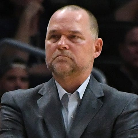 Denver Nuggets head coach Mike Malone looks on dur