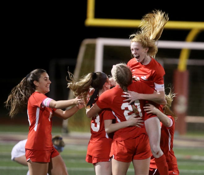 North Rockland celebrates after defeating Mahopac 2-1 in the Section 1 Class AA girls soccer championship at Arlington High School Nov. 3, 2019.