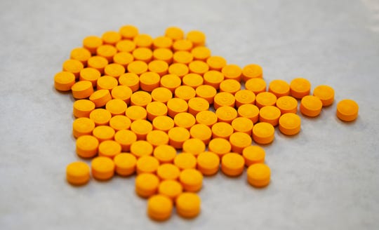 Tablets believed to be laced with the opioid fentanyl at the Drug Enforcement Administration Northeast Regional Laboratory in October 2019, in New York.