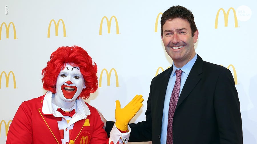 Former McDonald's CEO Steve Easterbrook makes an appearance with Ronald McDonald.