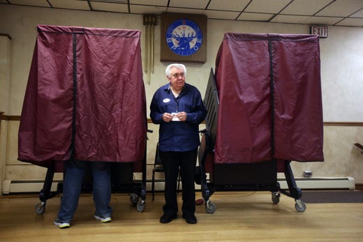 Alan Sobocinski of Freehold Boro, a poll judge, monitors the voting booths on Election Day at the Freehold Elks in Freehold, NJ Tuesday, November 5, 2019. 