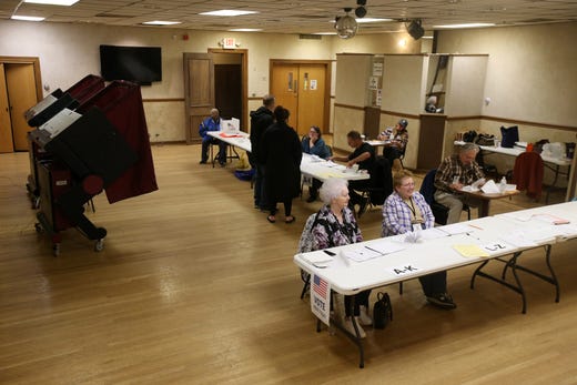 Election staff wait for the morning rush of voters on Election Day at the Freehold Elks in Freehold, NJ Tuesday, November 5, 2019. 
