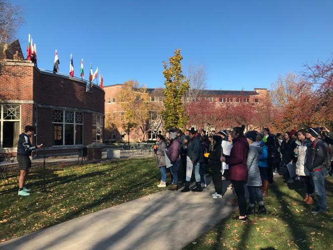 St. Norbert College students gather on campus Tuesday, Nov. 5, 2019, to protest the announced departure of President Brian Bruess.