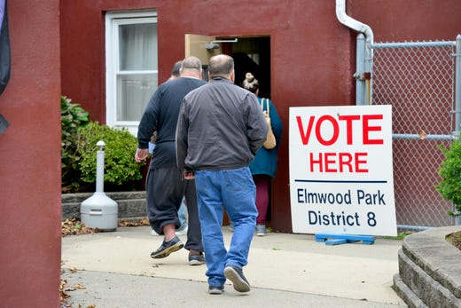 A voters walk into the polling area at the fire house on Mola Blvd in Elmwood Park, N.J. on Tuesday Nov. 5, 2019.