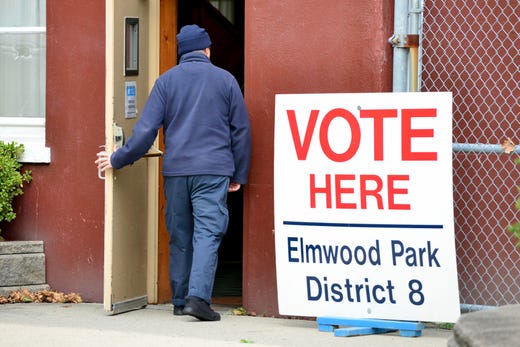 A voter walks into the polling area at the fire house on Mola Blvd in Elmwood Park, N.J. on Tuesday Nov. 5, 2019.