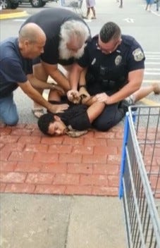 Screengrab from video taken of Gregory Lloyd Edwards' arrest at Walmart. Kathleen Edwards says her husband had a PTSD episode at Walmart, was arrested, taken to jail, then died at a hospital 1 day later.