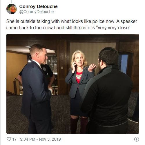 A reporter covering the gubernatorial election in Kentucky took a photo of a woman who rushed the stage at Governor Matt Bevin's party.