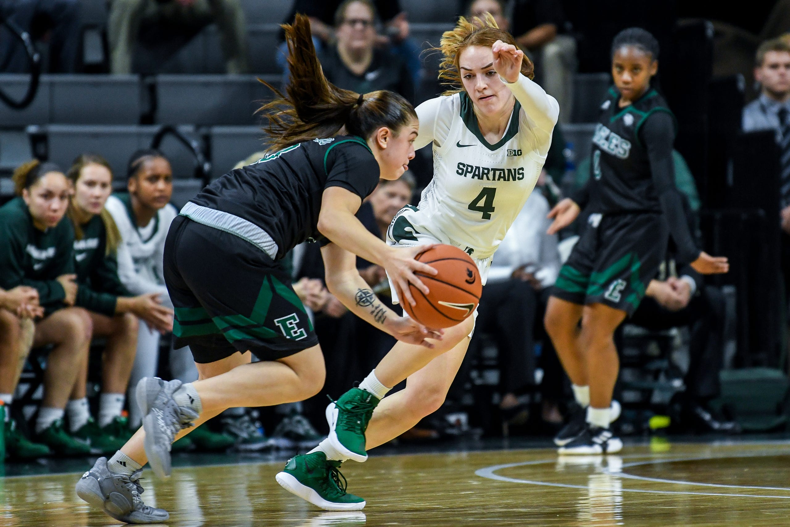Michigan State's Taryn McCutcheon, right, guards Eastern Michigan's Jenna Annecchiarico during the second quarter on Tuesday, Nov. 5, 2019, at the Breslin Center in East Lansing.