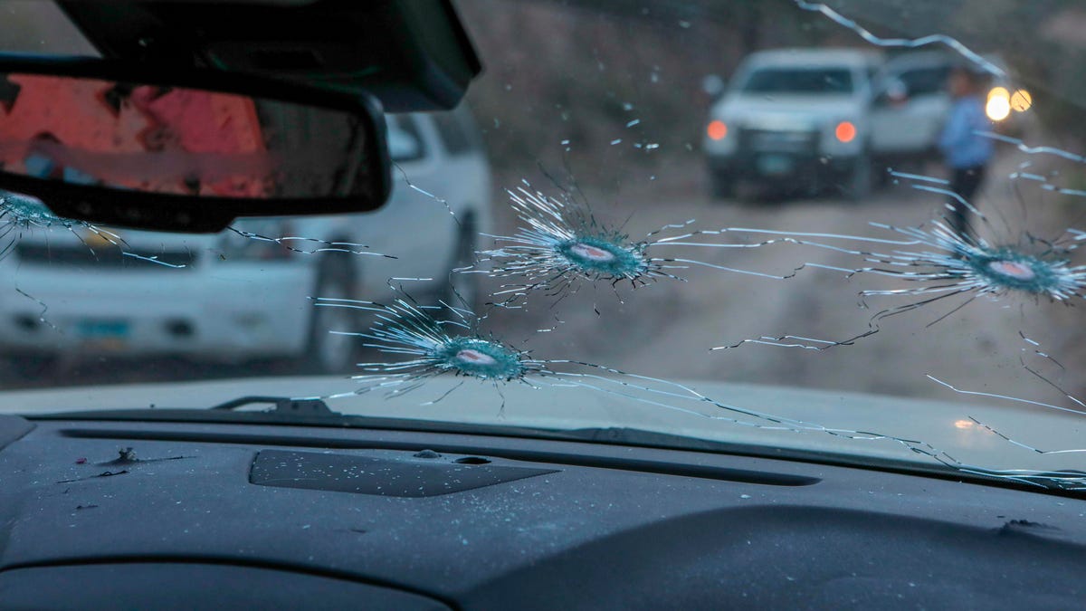 This photo shows a view of the car where part of the nine murdered members of the Lebaron family were killed during an ambush in Bavispe, Sonora mountains, Mexico, on November 5, 2019.